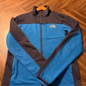The North Face Men's Blue and dark blue jacket Size small.